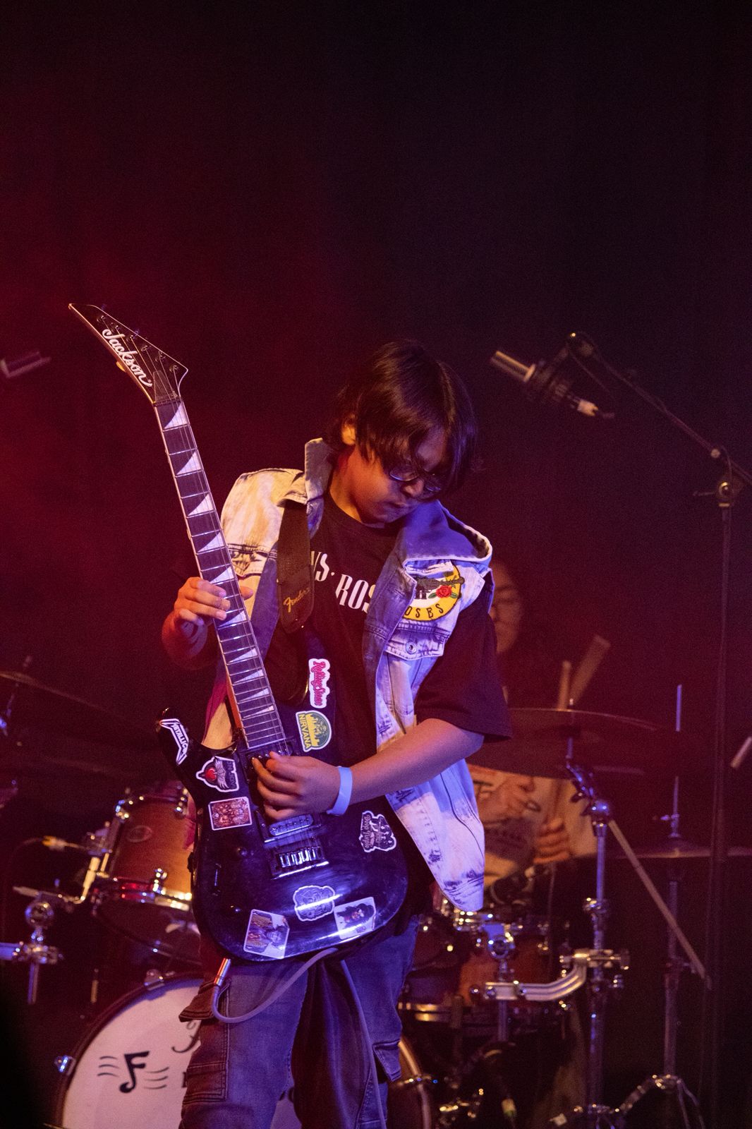 Steel N' Soul guitarist raising guitar